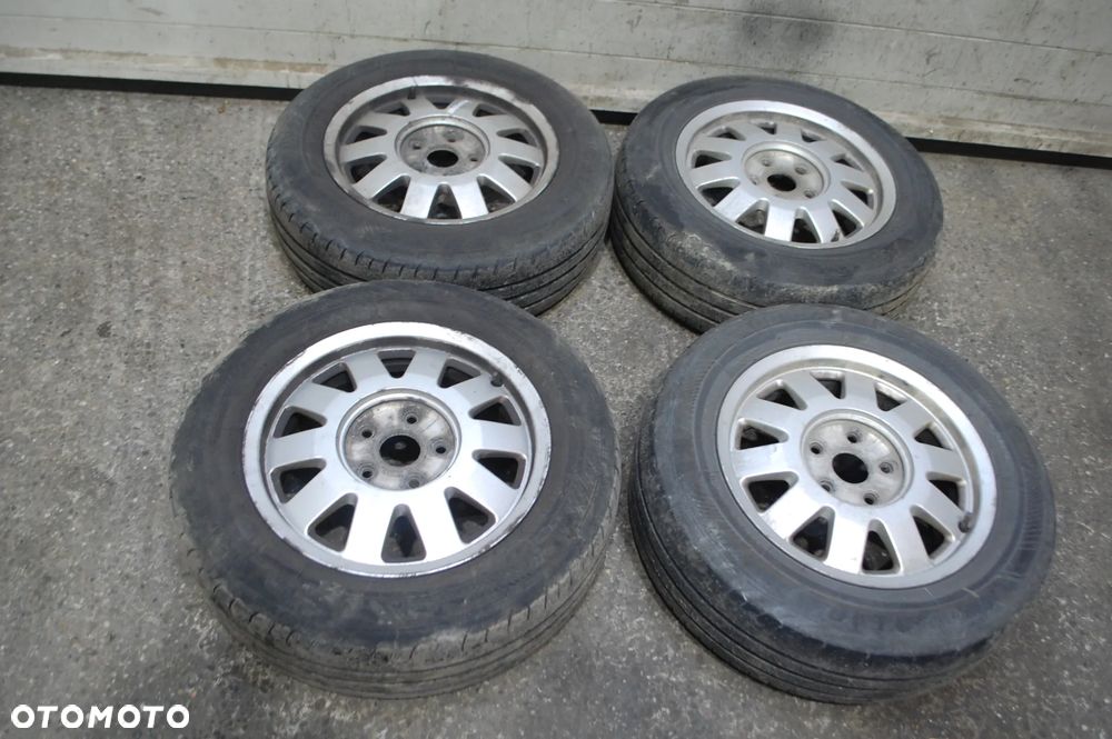 KOŁA FELGI ALUMINIOWE 8D0601025M 5X112 195/65R15 6J ET45 AUDI - 1