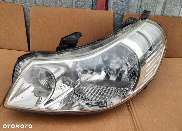 Reflektor lewy Lampa lewa Suzuki SX4 SX-4 Fiat Sedici