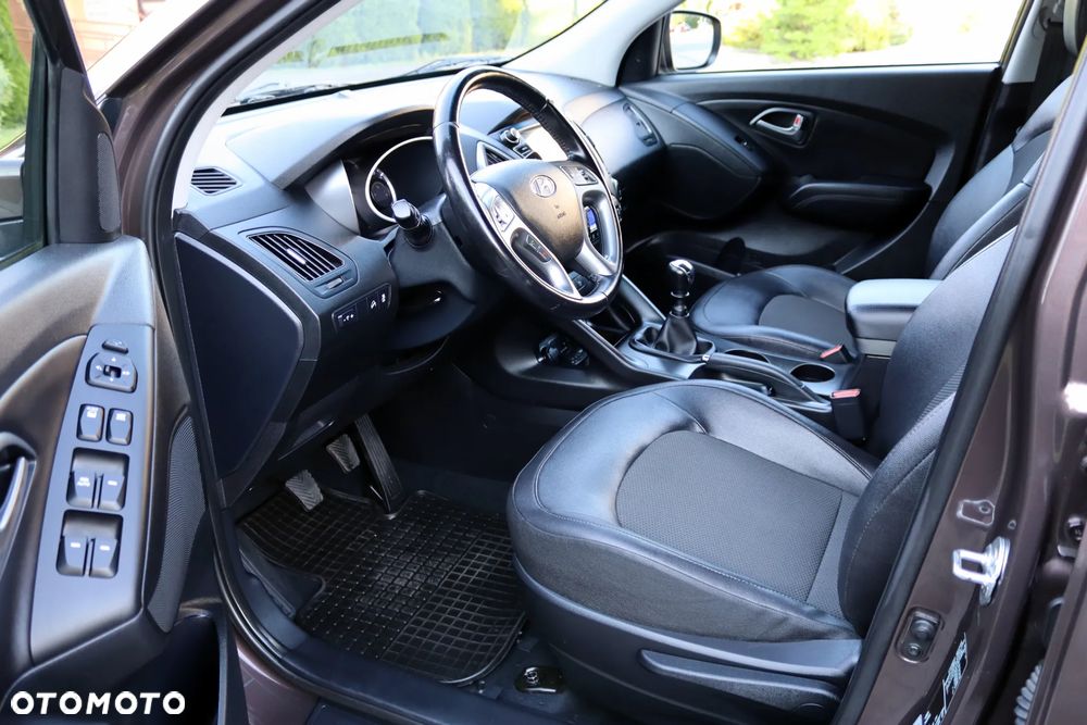 Hyundai ix35 blue 1.6 2WD Finale Gold - 14