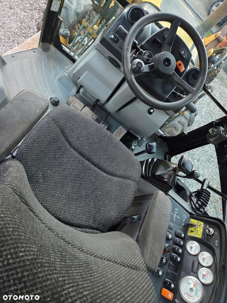 Caterpillar CAT 428E - 25