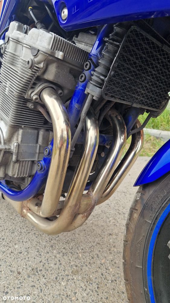Suzuki Bandit GSF 600 S wszystkie części: lampa,rama,kierownica,owiewka,zaciski hamulcowe,alternator,tarcze hamulcowe, kolektor wydechowy. - 17