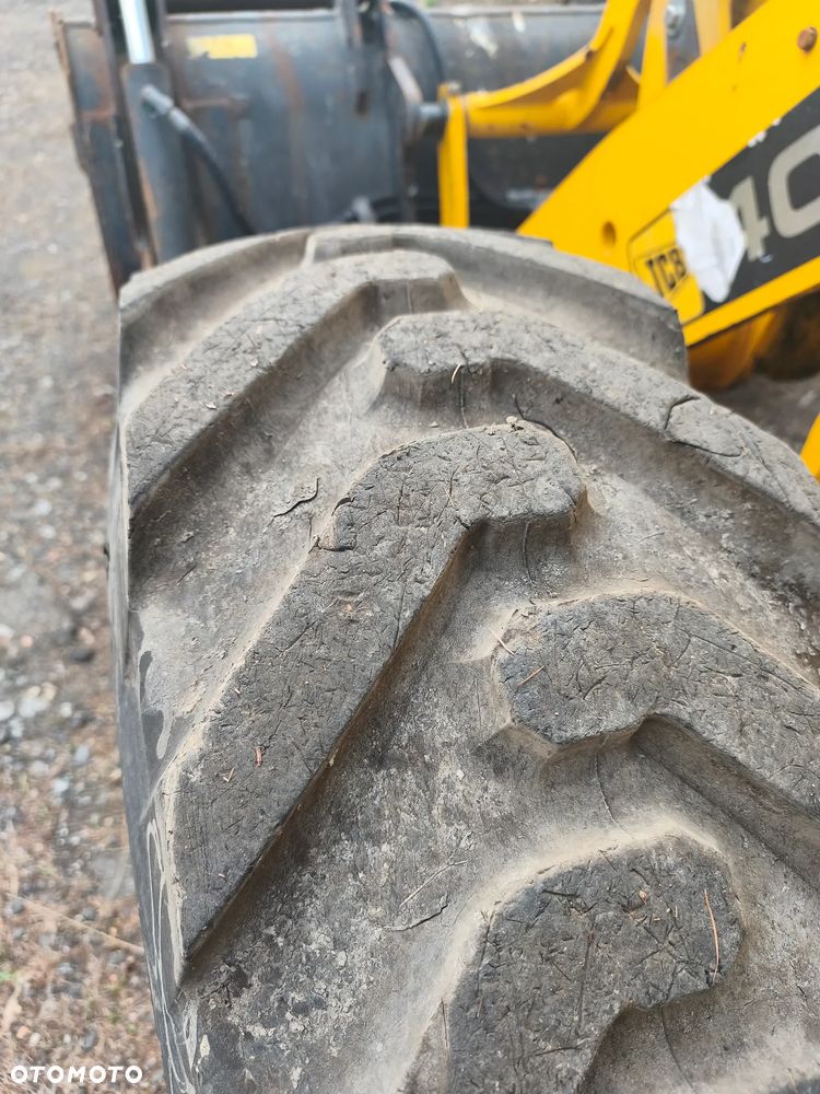 JCB 406 - 11