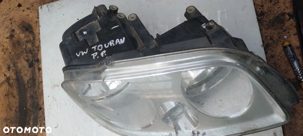 VW Touran I lampa prawa przód - 1