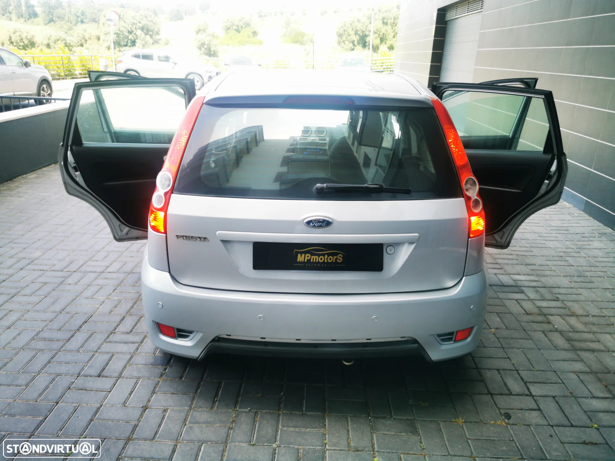 Ford Fiesta 1.25 Ghia - 14