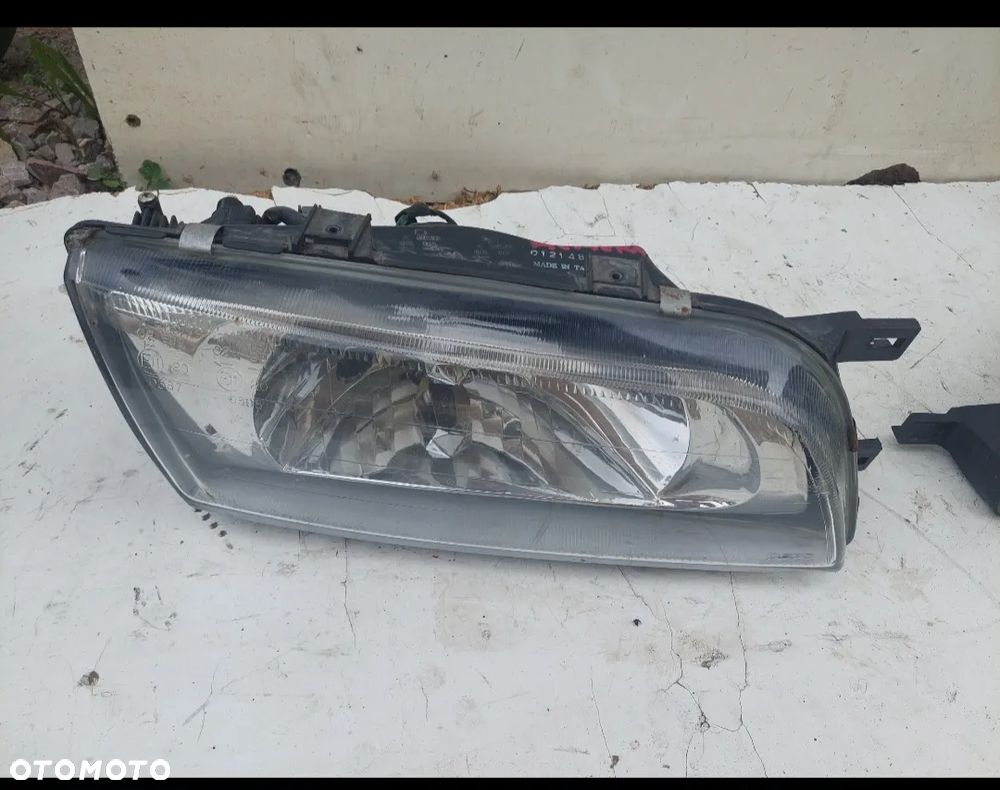 LAMPA REFLEKTOR LEWA PRAWA NISSAN ALMERA N15 - 2