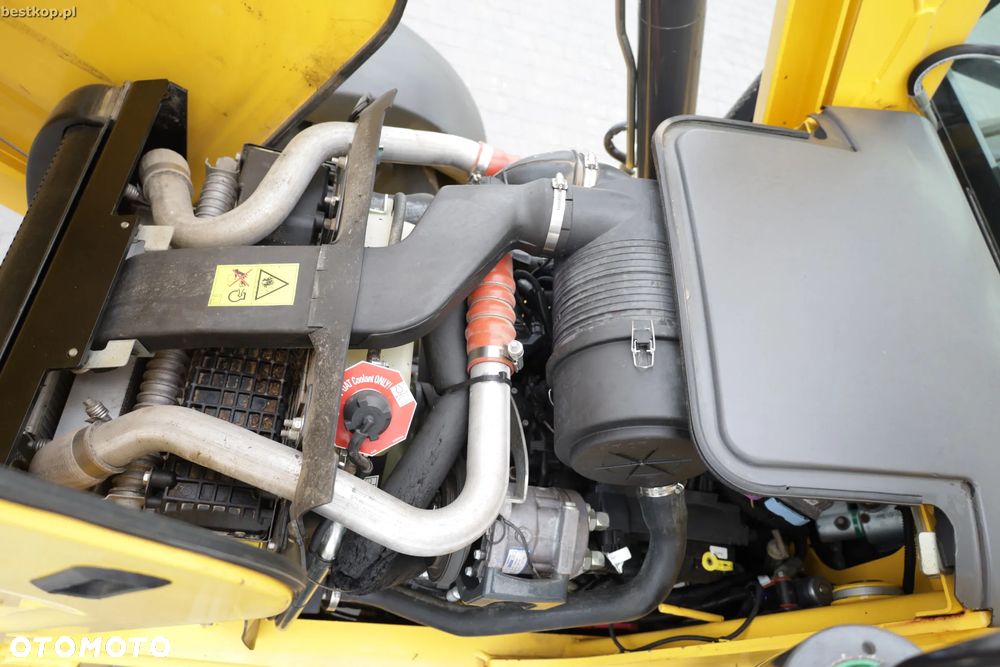 New Holland B100C - 34