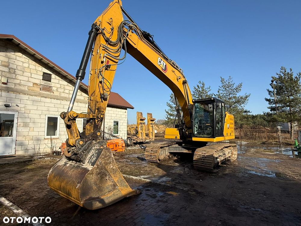 Caterpillar 323 - 16