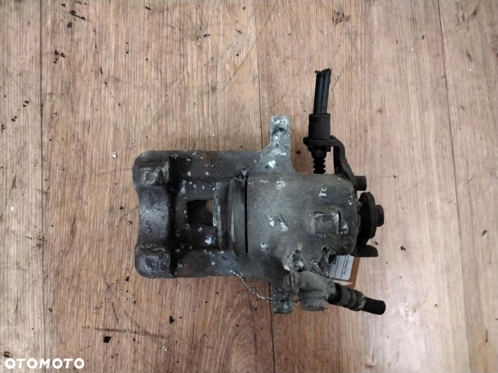 AUDI A4 B6 ZACISK HAMULCOWY LEWY TYŁ - 2