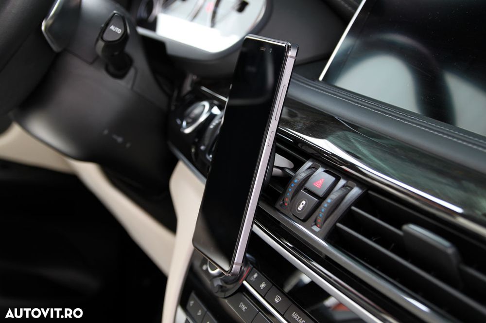 Suport auto magnetic Negru pentru telefon AMIO, fixare in grila de ventilatie, rotire 360 grade - 1