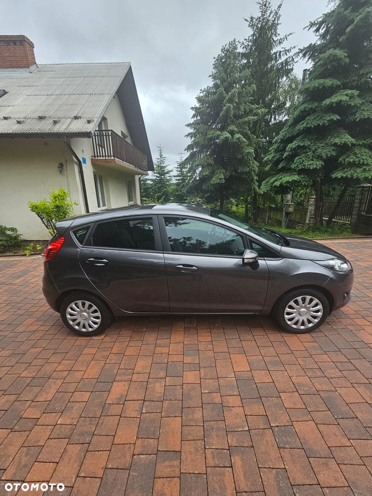 Ford Fiesta 1.4 Ghia - 11