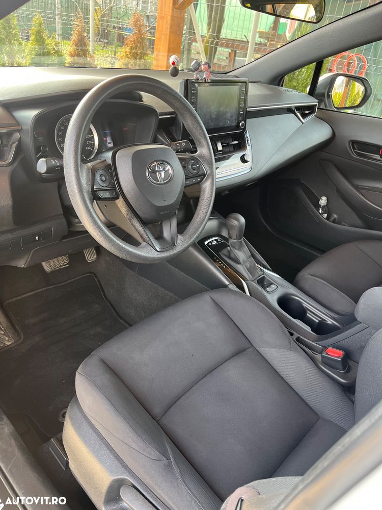 Toyota Corolla 1.8 HSD Active - 8