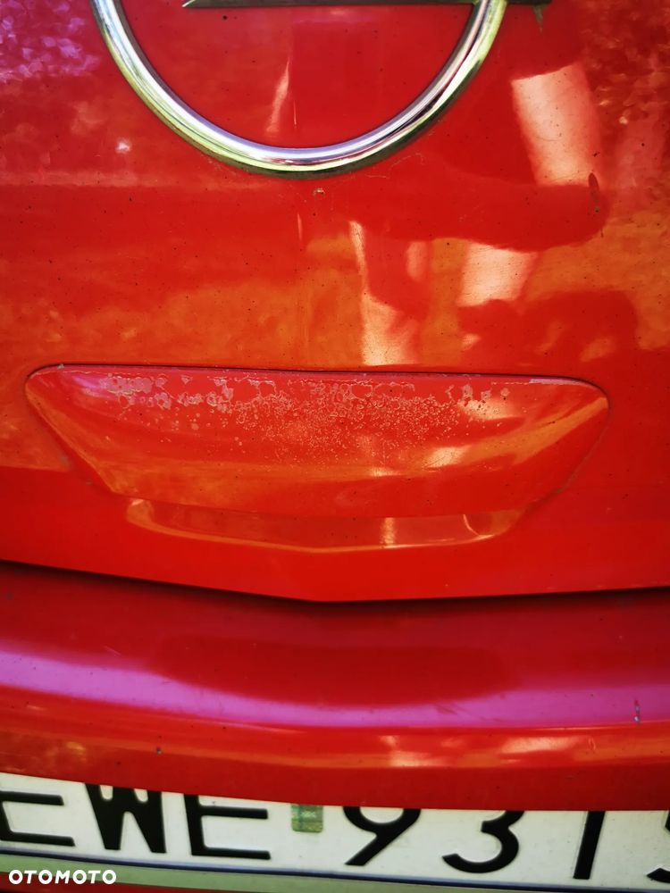 Opel Corsa 1.2 16V - 12