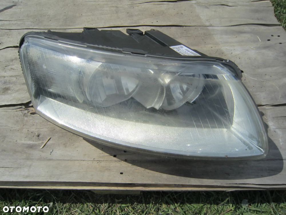Lampa przód przednia Audi A6 C6 4F0941004 Anglik