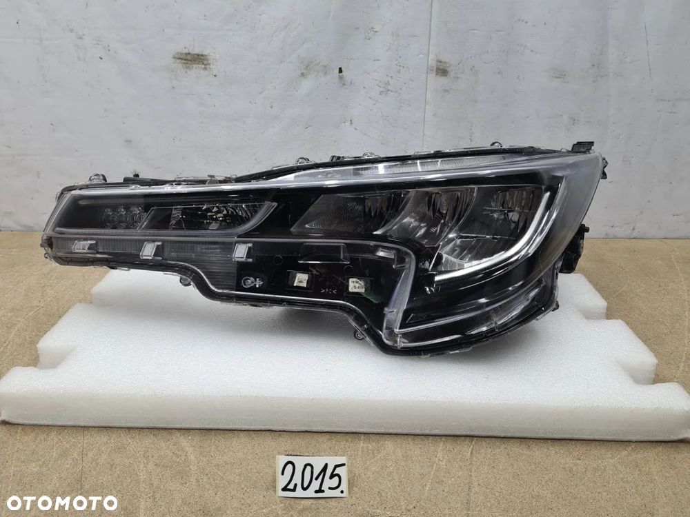 Toyota Corolla E21 kombi/HB 81150-02S60 lampa lewy lewa przednia przód - 1