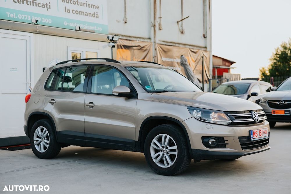 Volkswagen Tiguan 1.4 TSI 4Motion Exclusive - 1