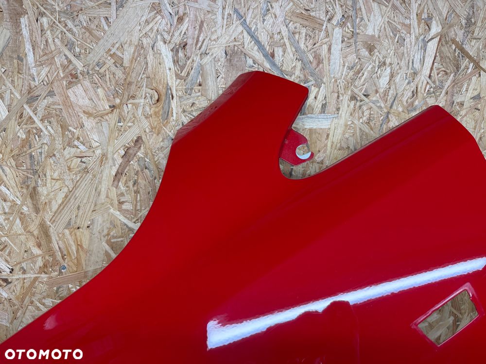 BŁOTNIK LEWY PRZÓD LEWY PRZEDNI OPEL CORSA E CZERWONY 50B - 22