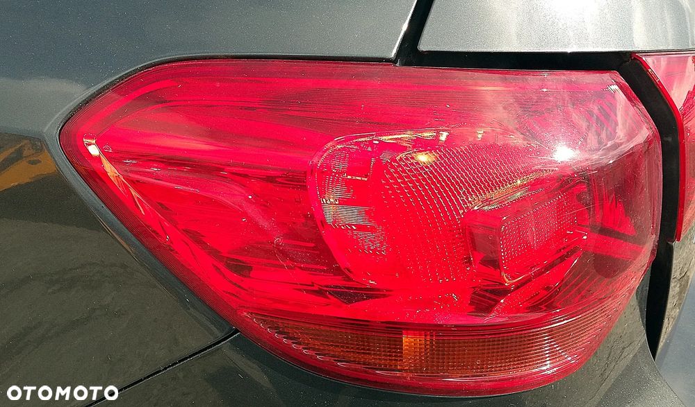 OPEL ASTRA J IV 4 LIFT LAMPA LEWA TYŁ TYLNA W BŁOTNIK - 1