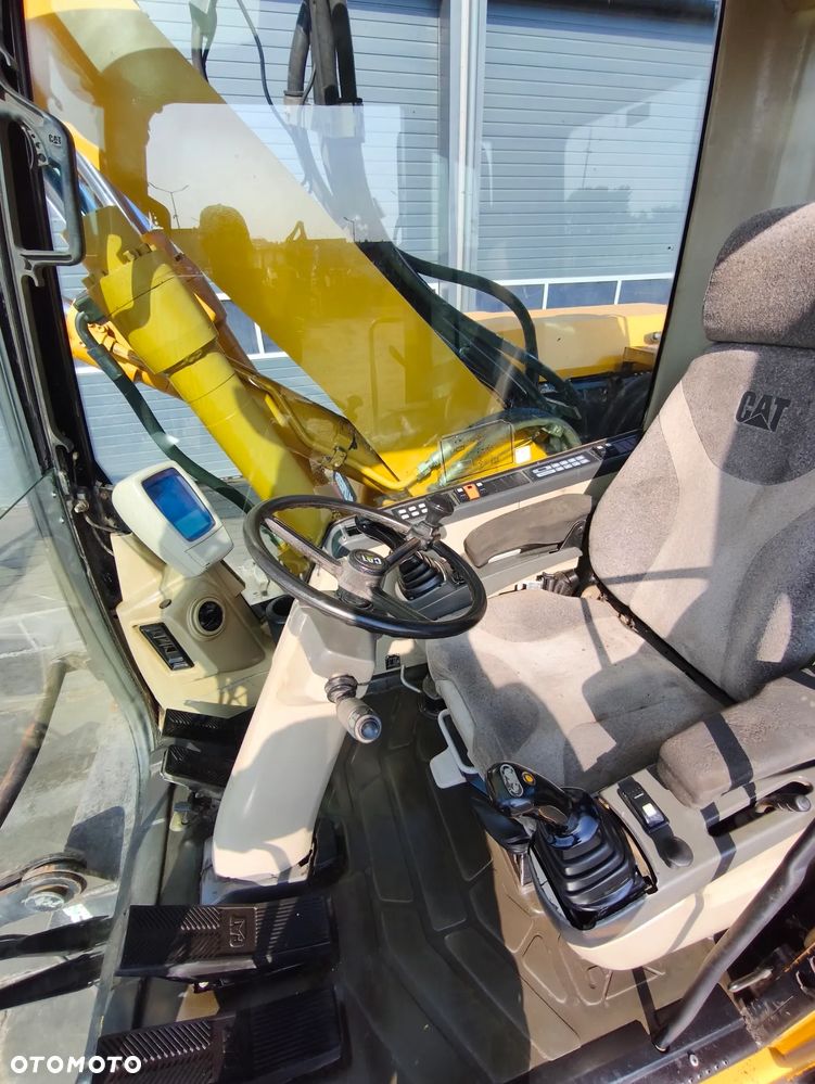 Caterpillar M313C - 11