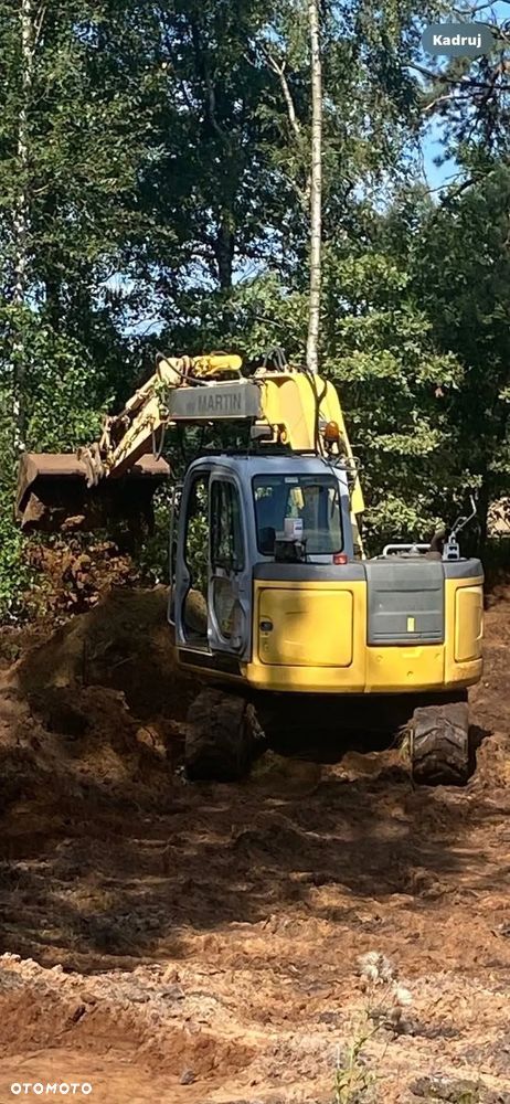 New Holland E 70 SR - 1