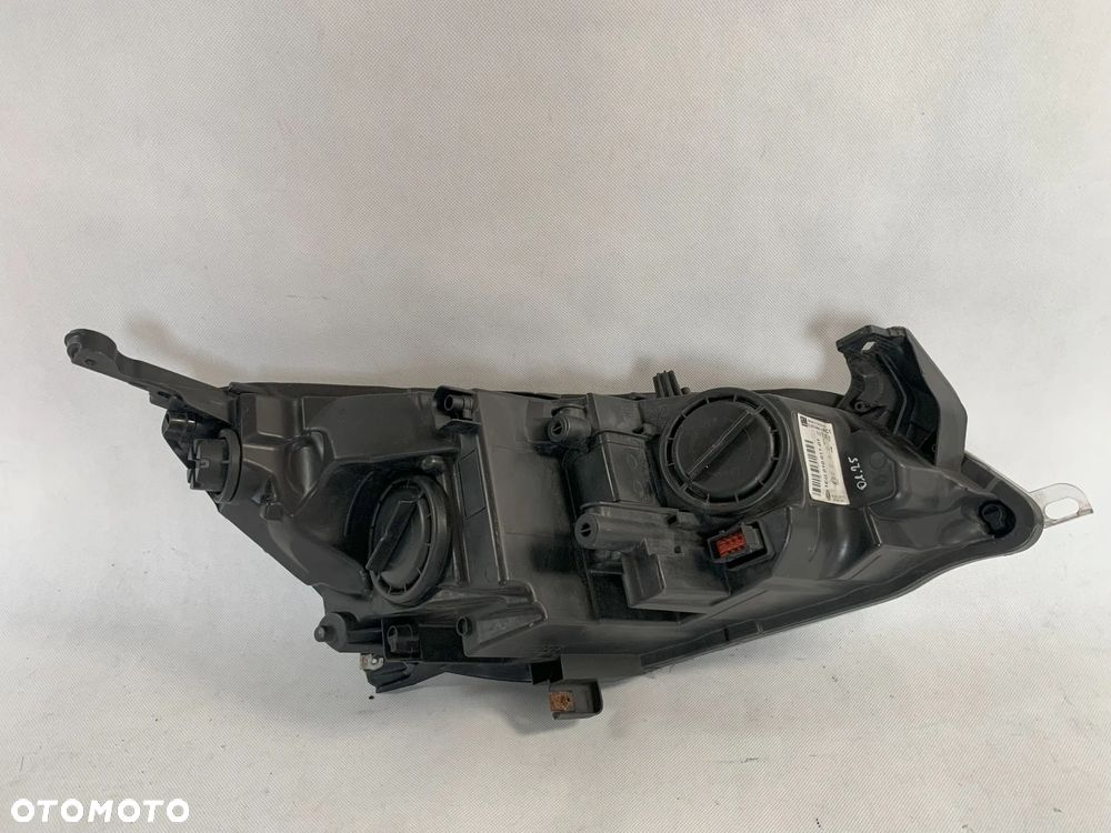 Opel Astra 4 IV J 10r Reflektor lewy lampa lewa 2010 - 3
