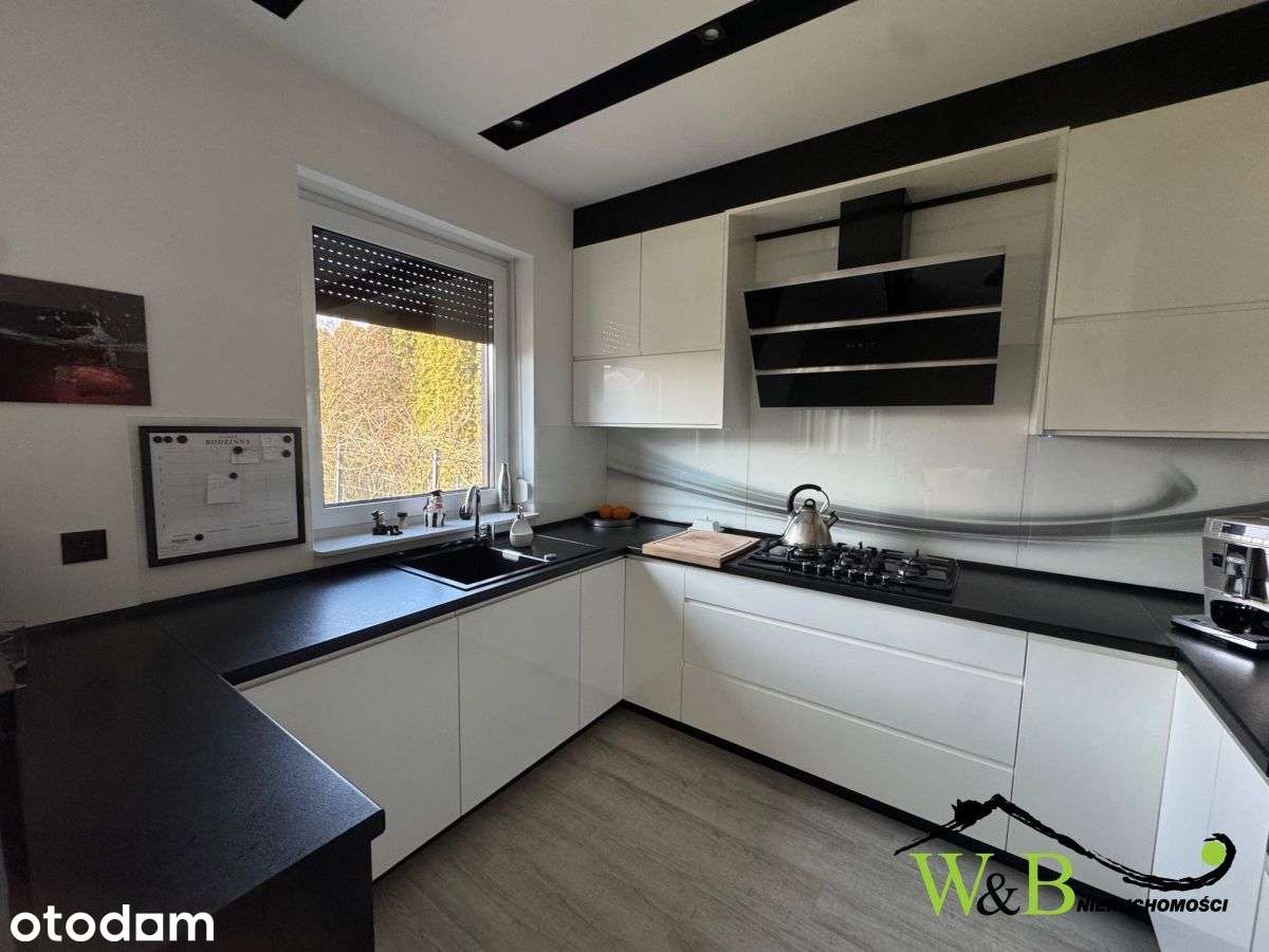 Urządzony apartament z ogródkiem