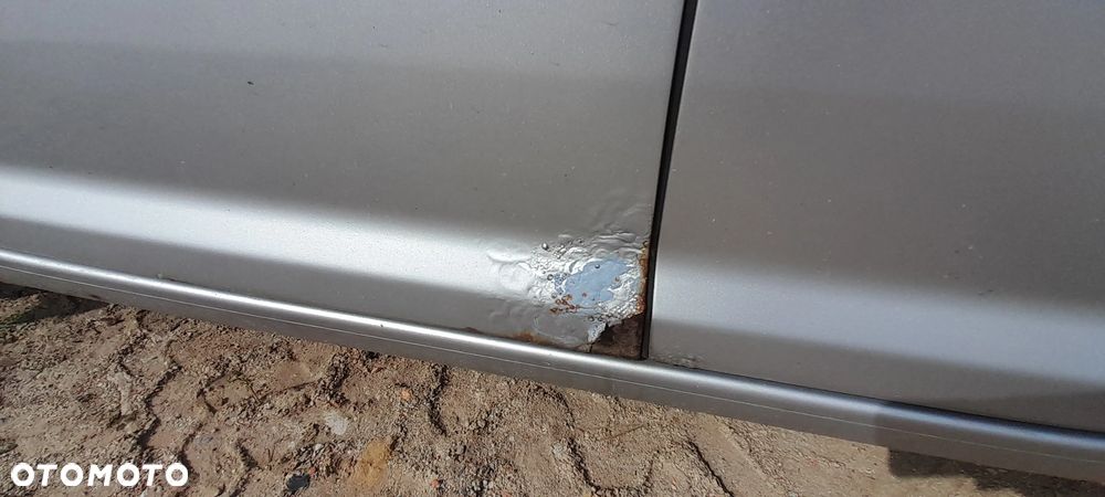 VW TOURAN I DRZWI LEWY PRZÓD PRZEDNIE LEWE KOMPLETNE LA7W nr. 106/7 - 2