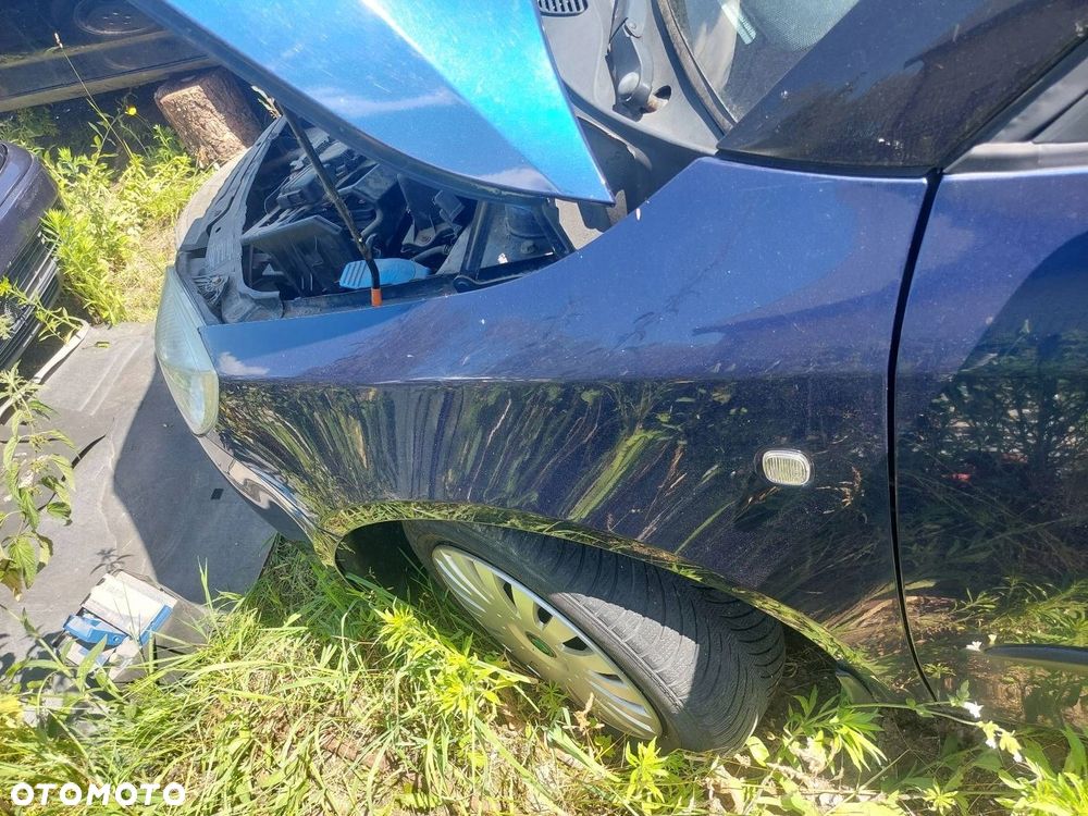 BŁOTNIK LEWY PRZÓD SKODA FABIA II 9462 - 1