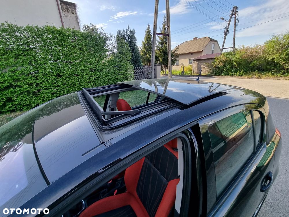Opel Corsa 1.4 16V Cosmo - 29