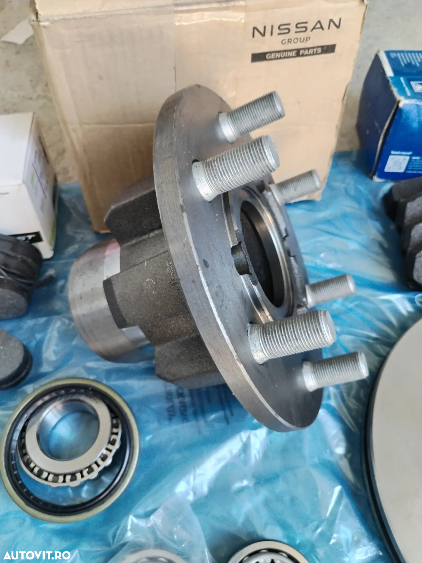 Butuc roata fata NISSAN ATLEON L35 ECO-T100 L35-09 EBRO L35-08 SEMERING ROATA RULMENTI DISC PLACUTE SURUBURI KIT PIVOTARE - 13