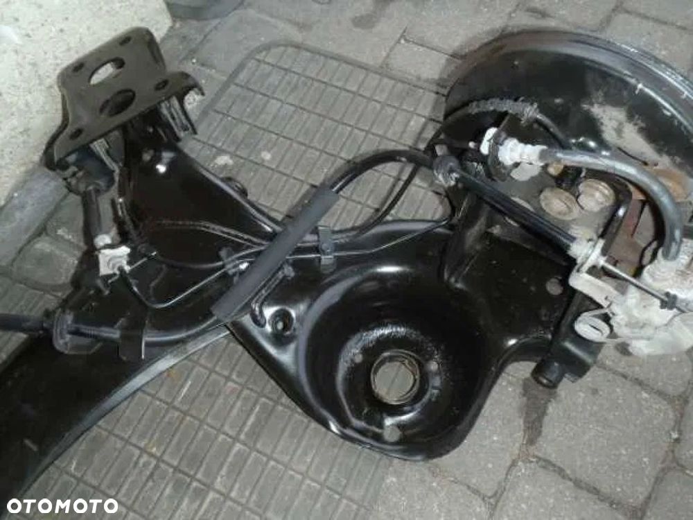 tarcza osłona błotna wieszak zacisk jarzmo piasta stilo bravo II delta - 2