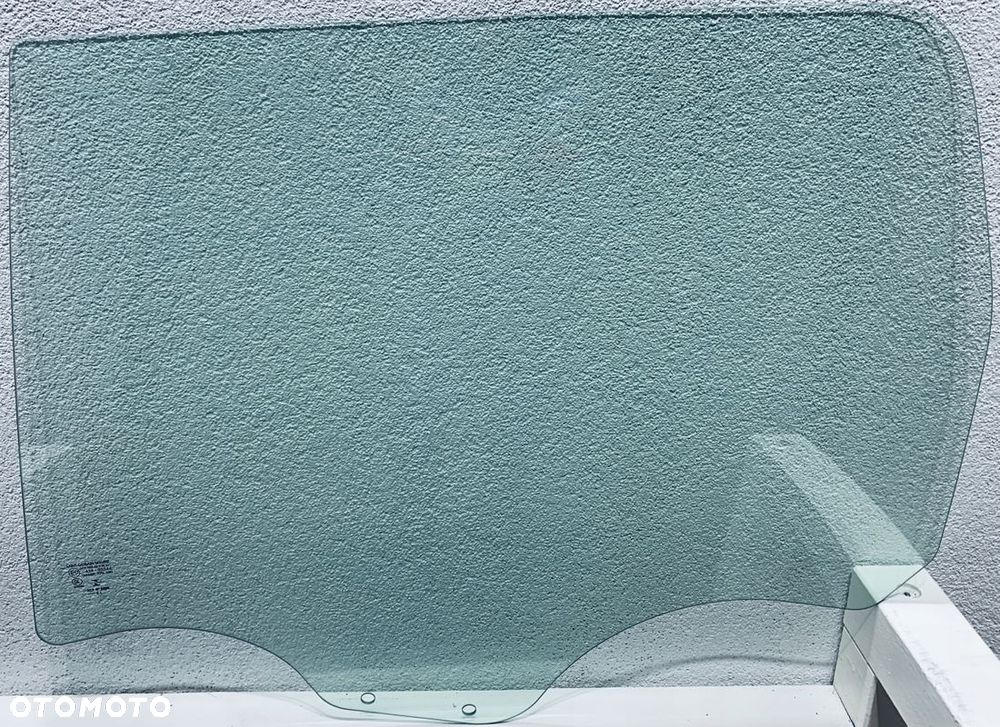 Szyba boczna lewa tylna opuszczana DACIA LOGAN KOMBI 2007-2013