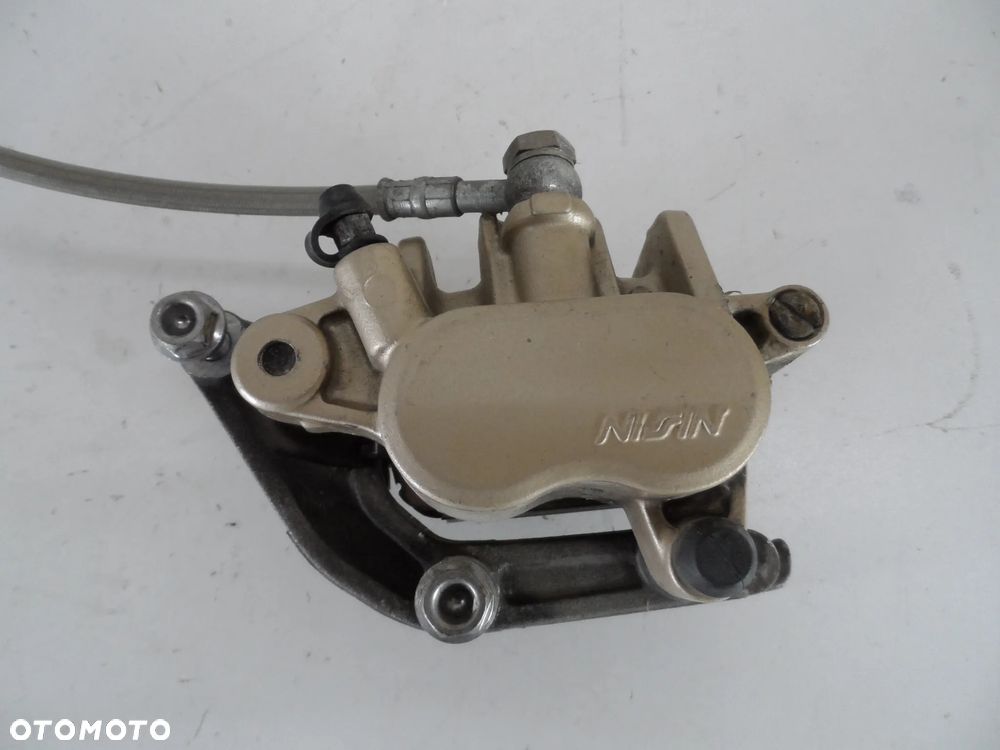 HONDA HORNET 600 PC36 zacisk hamulcowy przód jarzmo P,L - 1