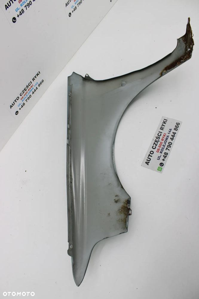 Volvo V40 lift Błotnik Prawy Przód 352-22 - 6