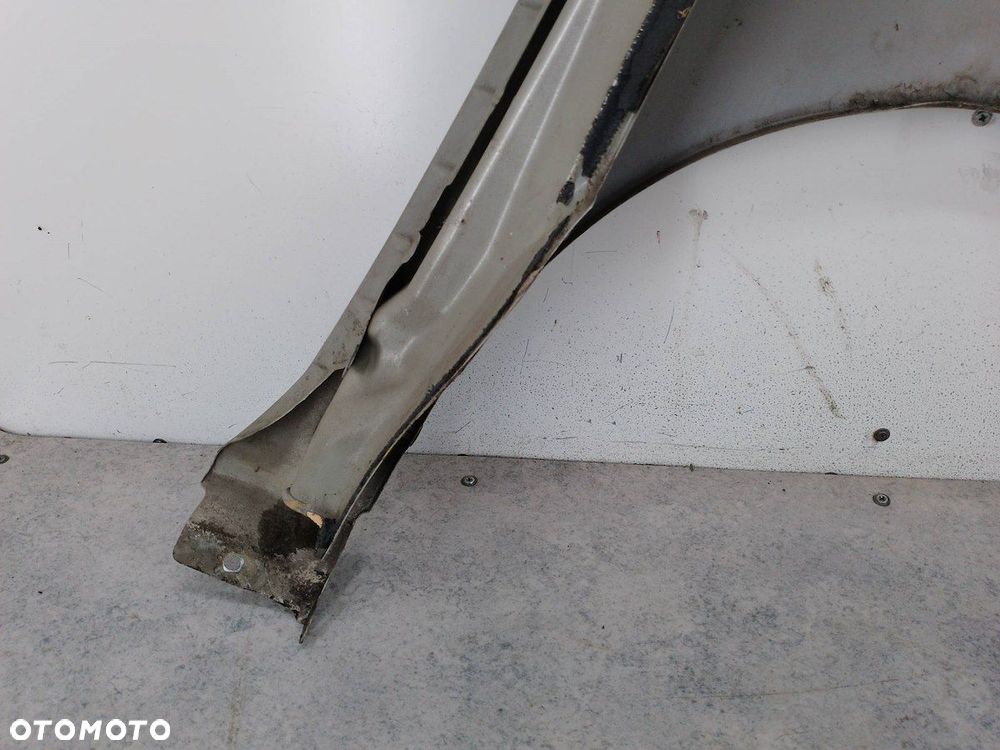 BŁOTNIK LEWY PRZÓD NISSAN TIIDA K32 - 11