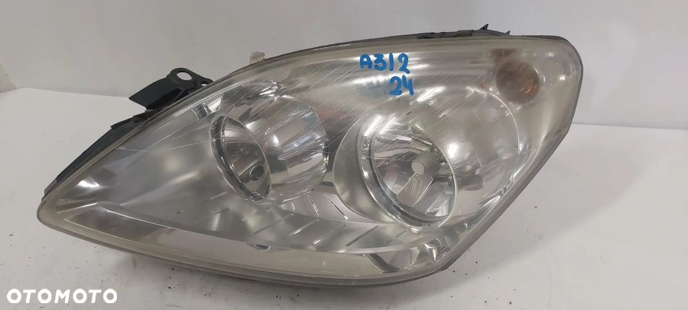 .  PRZOD PRZEDNIA LAMPA PRAWA OPEL ZAFIRA B !USZKODZONE UCHWYTY! - 1