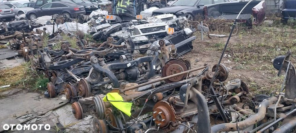 BELKA OŚ ZAWIESZENIA TYŁ BĘBNY BEZ ABS SUZUKI IGNIS I - 7