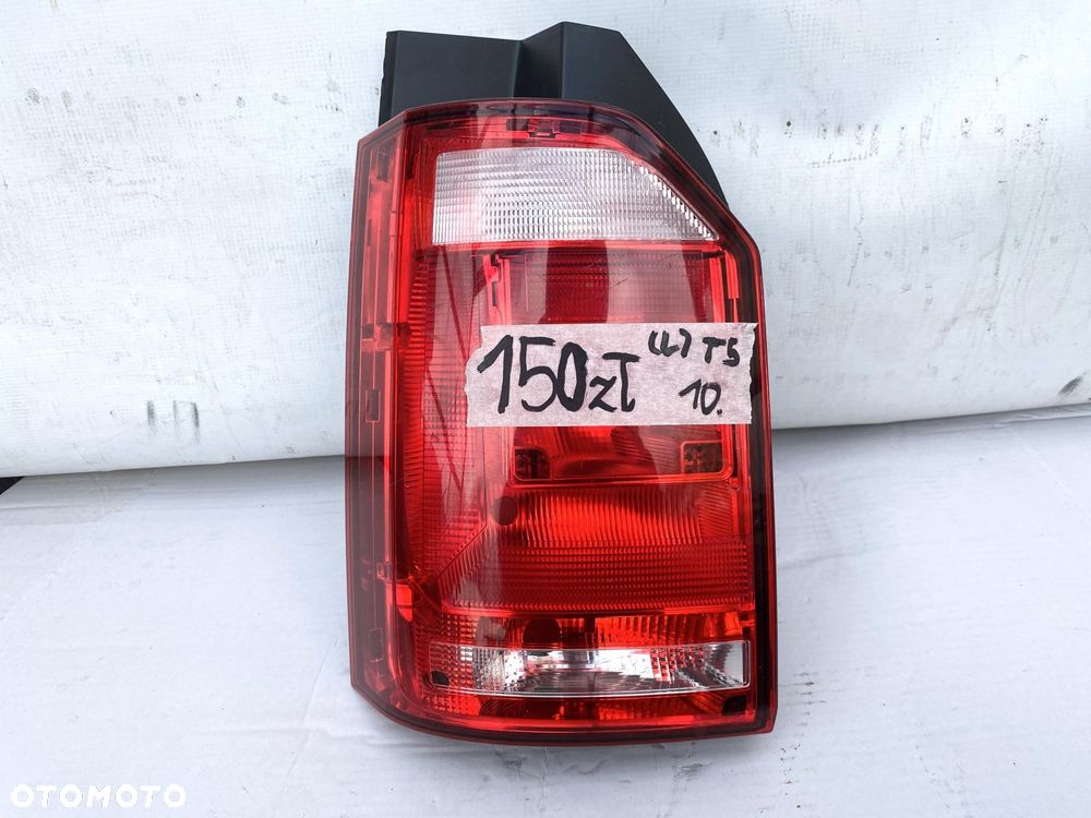 VW TRANSPORTER CARAVELLE T6 15- LAMPA TYLNA LEWA klapa 7E0945095AD ORYG - 1