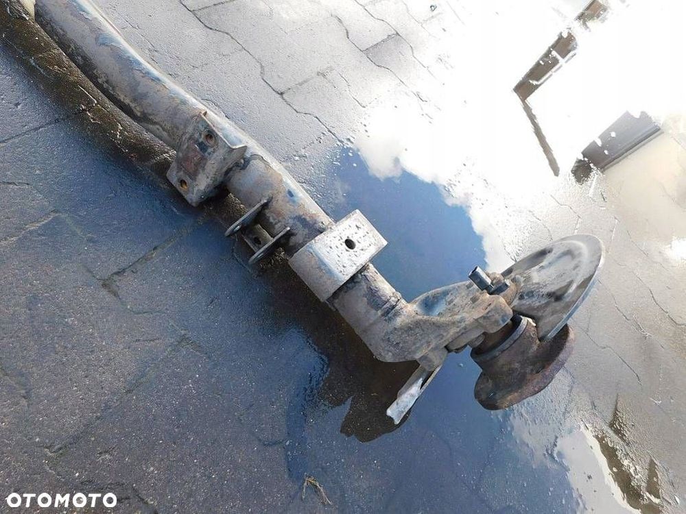 VW CADDY III 1.9TDI 05r BELKA OS ZAWIESZENIA TYŁ - 11