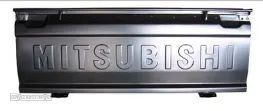 Tampa da mala Mitsubishi L200 K14 K34 MB506298 - 1