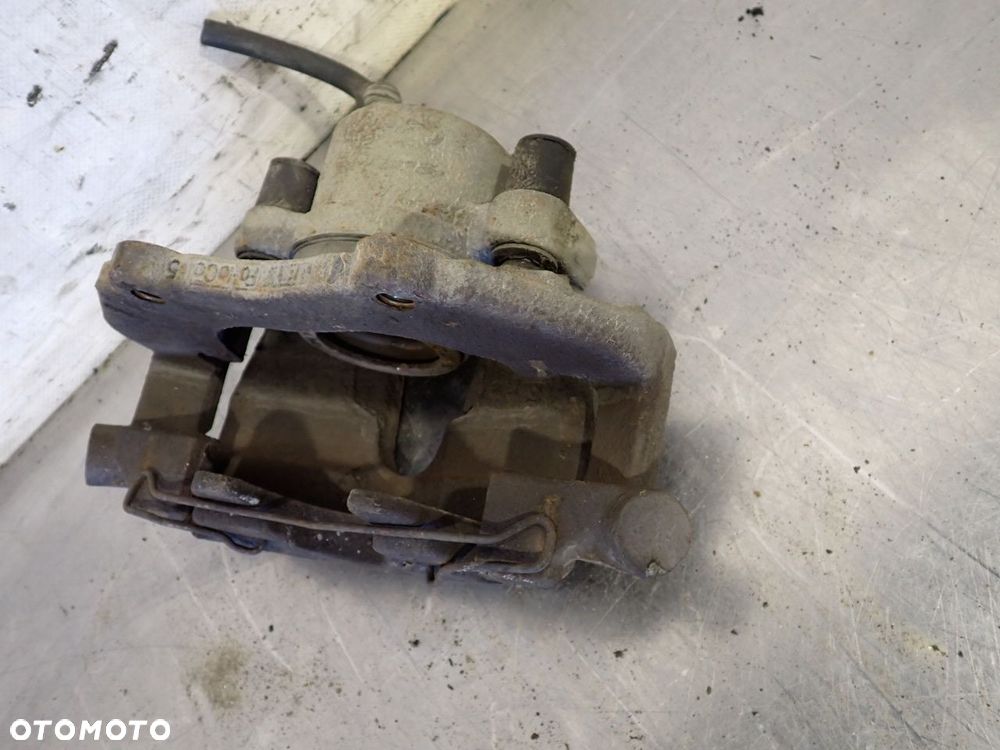 ZACISK HAMULCA LEWY PRZÓD FORD FOCUS MK2 LIFT 2.0 - 4