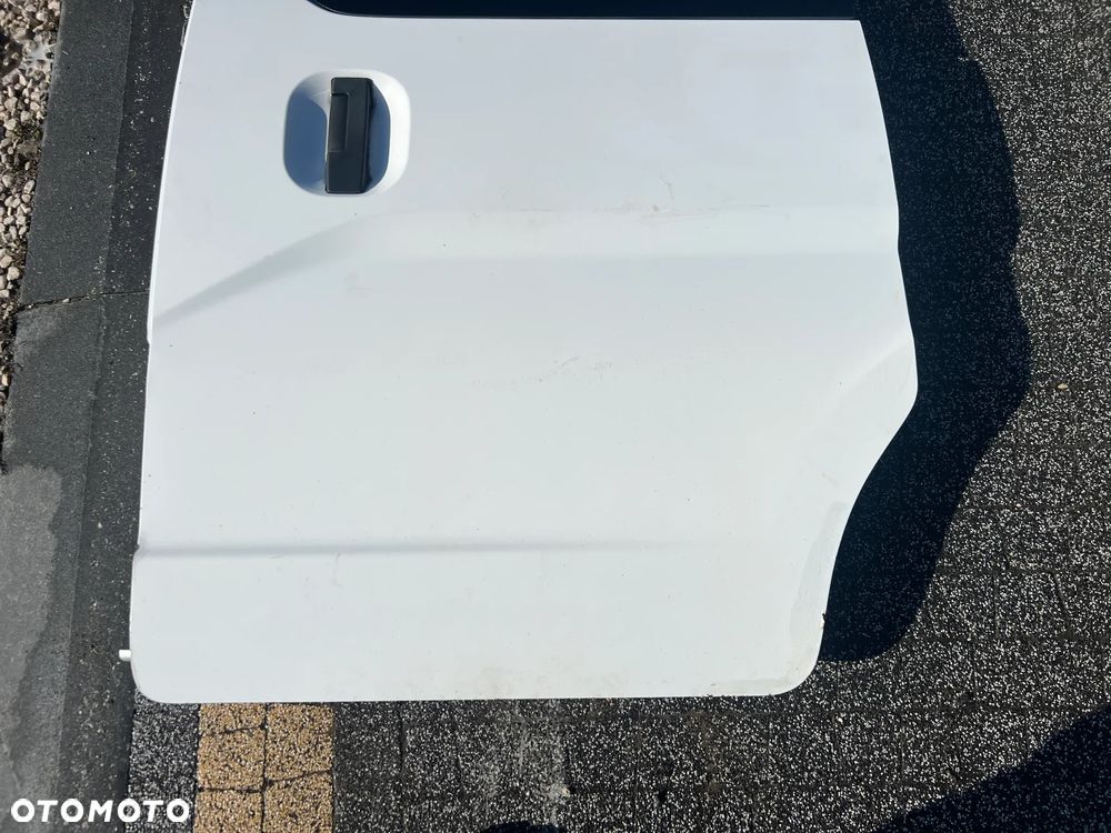 DRZWI BOCZNE PRZESUWNE LEWE NISSAN NV200 QM1W - 2