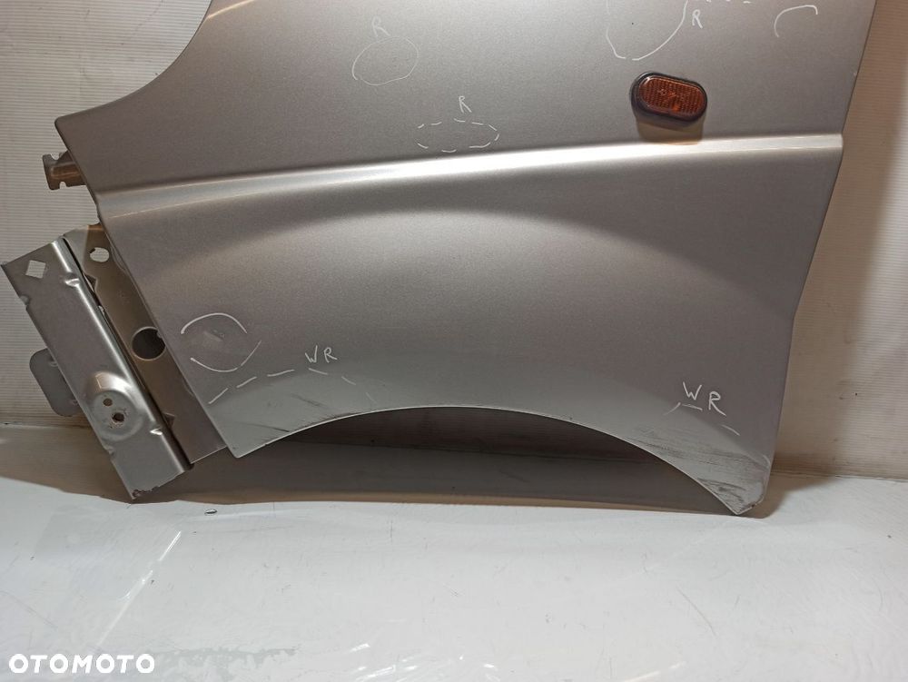 BŁOTNIK LEWY PRZEDNI OPEL VIVARO A - 3