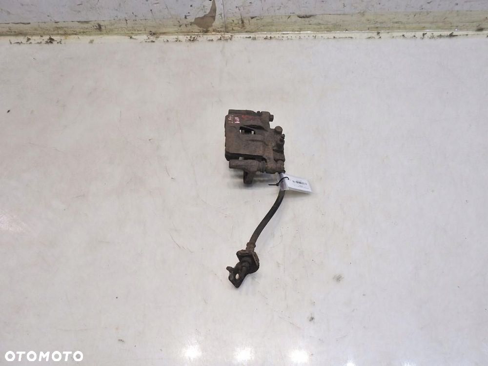 ZACISK HAMULCOWY PRAWY TYŁ MITSUBISHI LANCER VIII 1.8 - 7