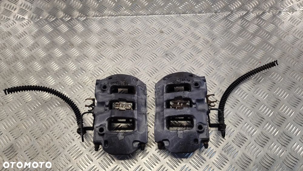 VW TOUAREG 7P 10-18R ZACISK ZACISKI TYL 4-TŁOCZKOWE 3.0 V6 PRAWY LEWY