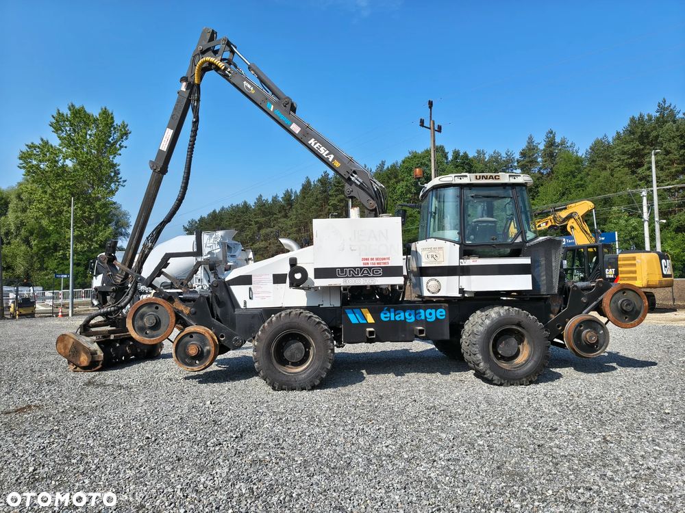 Caterpillar Caterpillar UNAC 300RR Mulczer kolejowy Liebherr atlas dwudrogowy zw - 9