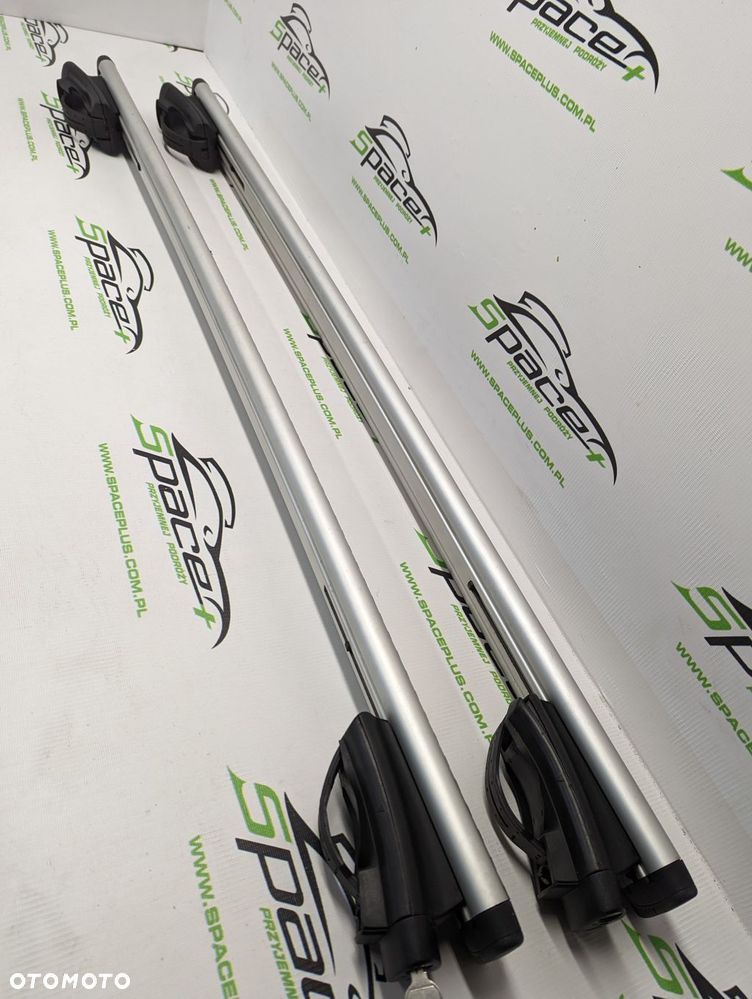 Bagażnik dachowy bazowy na otwarte relingi Thule 775 wingbar 118cm z napisem Renault. - 7