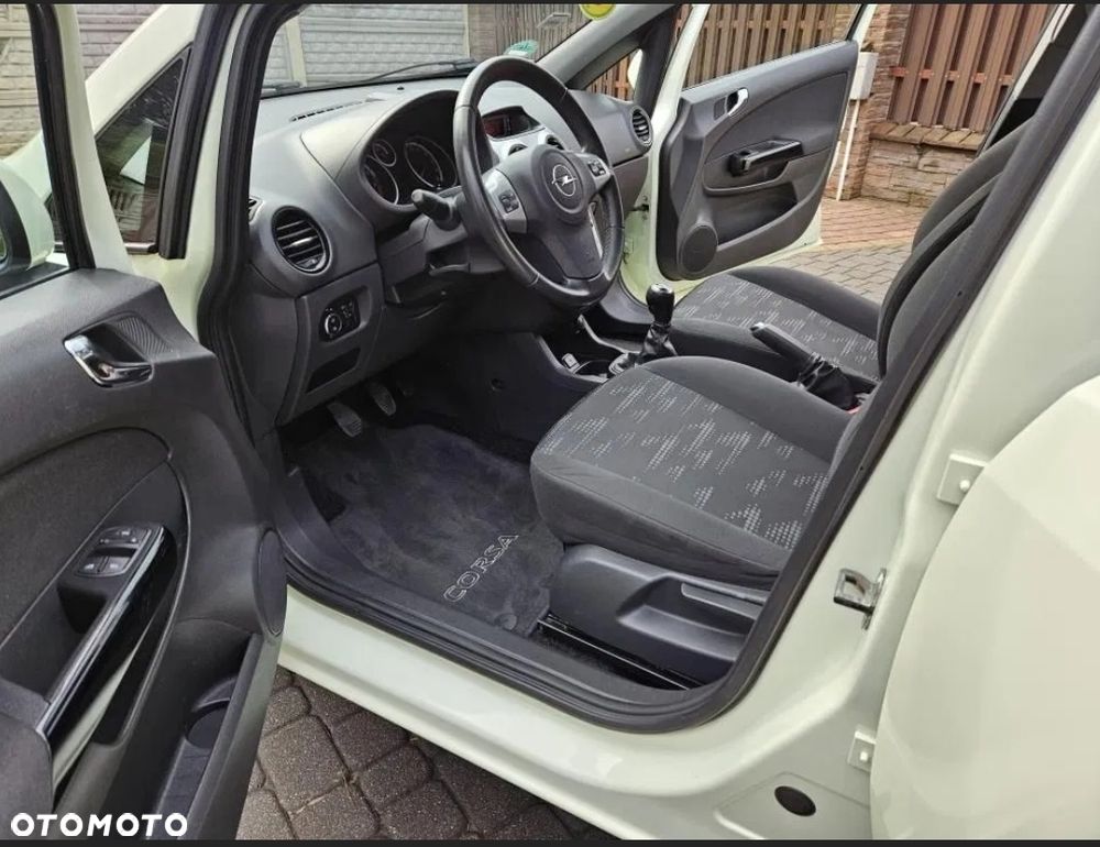 Opel Corsa 1.4 16V Enjoy - 9