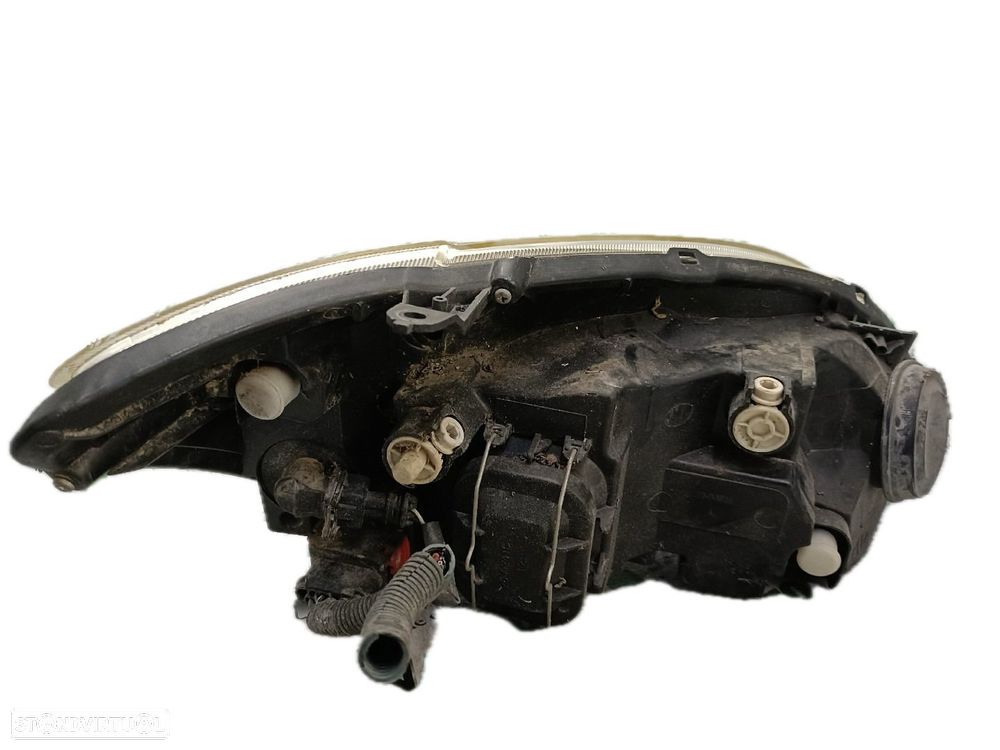 Farol Esq Toyota Corolla (_E12_) - 2