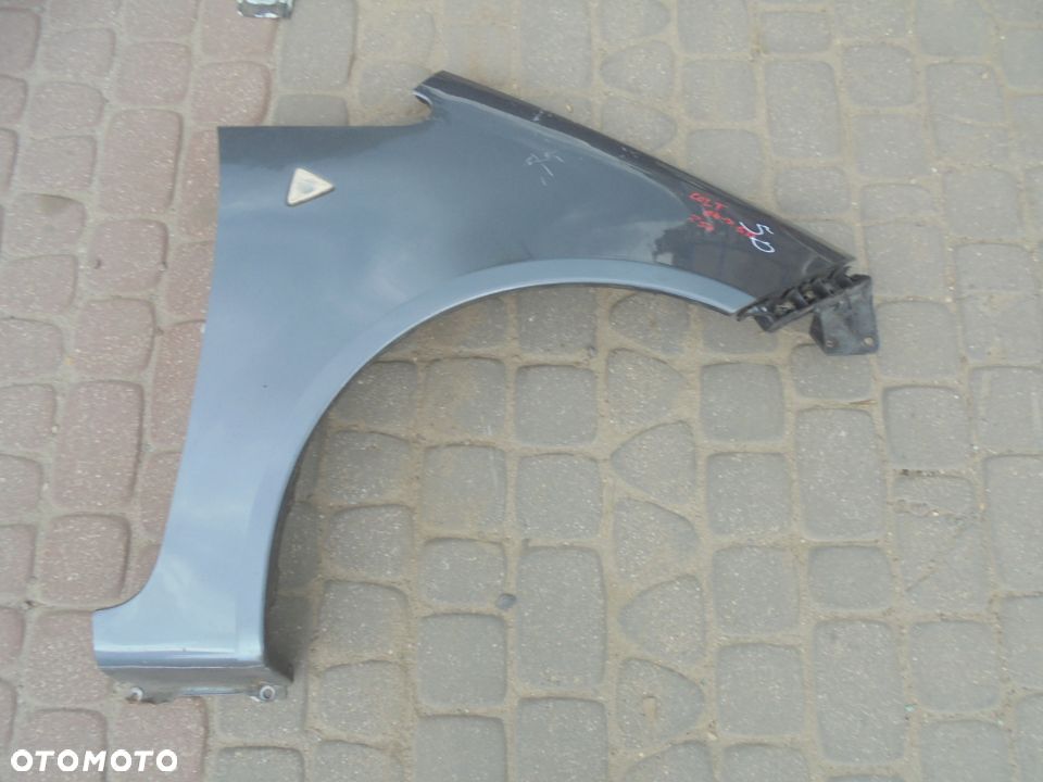 BŁOTNIK PRAWY MITSUBISHI COLT 04-08 5 DRZWI - 1