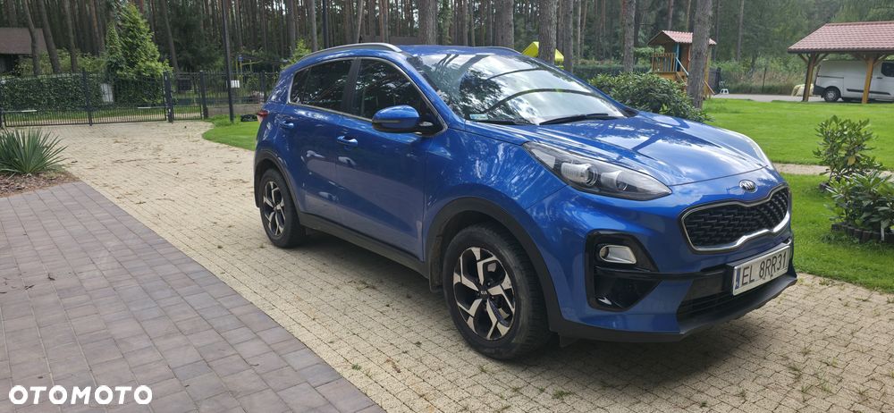 Kia Sportage - 4